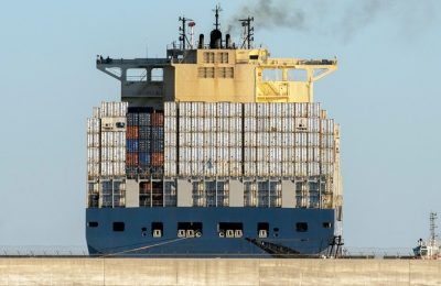 Container,Ship,While,Docking,In,Genoa,Harbor,Italy