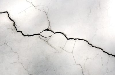 Grunge concrete cement wall with crack ,for your design and texture background