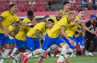 Brazil's players celebrate winning the Tokyo 2020 Olympic Games men's semi-final football match between Mexico and Brazil at Ibaraki Kashima Stadium in Kashima city, Ibaraki prefecture on August 3, 2021. (Photo by MARTIN BERNETTI / AFP) (Photo by MARTIN BERNETTI/AFP via Getty Images)